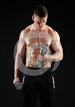 Man with dumbbells exercising
