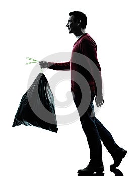 Man dumping garbage bag