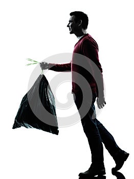 Man dumping garbage bag photo