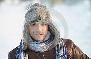 Man in an ear flap hat