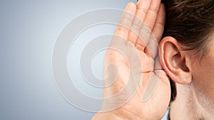 Man ear listening, copy space background