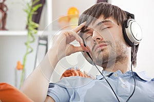 Man in earphones relaxing
