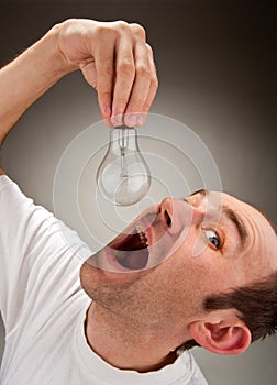 Man eating bulb