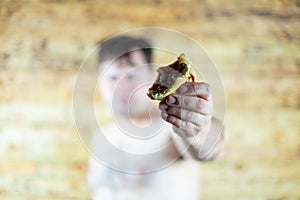 Man eating Burger. Topless man eating burger