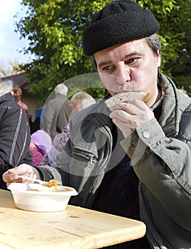 The man eating the cabbage soup