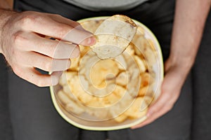 Man eating chips