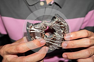 Man eating donut