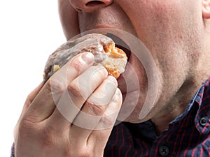 Man eating donut