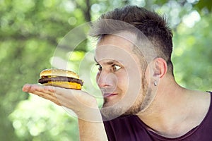 man eating a hamburger