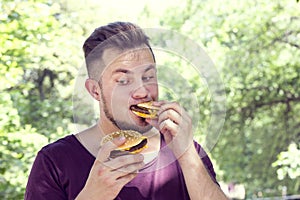 Man eating a hamburger