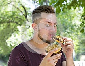 Man eating a hamburger