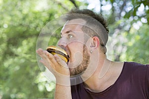 Man eating a hamburger