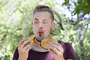 Man eating a hamburger