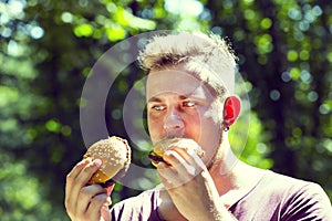 Man eating a hamburger