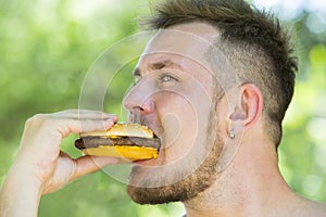 Man eating a hamburger