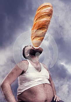 Man eating a huge bread