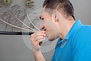 Man eating a mouthful of bread photo