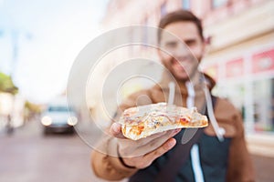 Man eating pizza