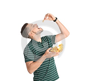 Man eating potato chips