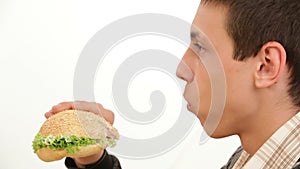 Man Eats A Sandwich Isolated Close-up