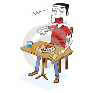 Man eats some food on a table