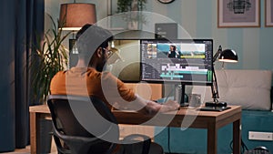 Man editing video on computer