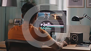 Man editing video on computer