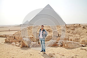 Man with Egypt pyramids view