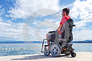 Man on electric wheelchair
