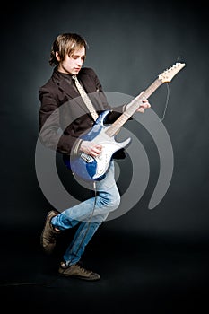 Man with electro guitar photo