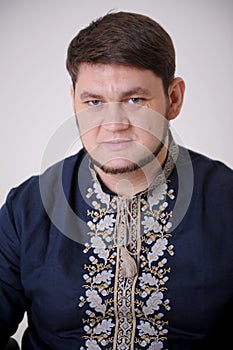 man in embroidered shirt national hero Patriot Ukrainian symbols production arts and crafts art of Ukraine emotions are