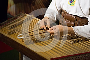 A man emotionally plays the beautiful national instrument of the Cimbalom