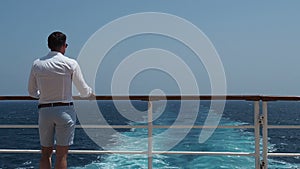 Man on the empty deck of a cruise liner