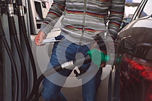 Man with empty pockets because of high petrol and fuel prices. Expensive gasoline