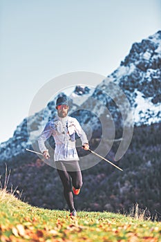 Man during endurance training with poles