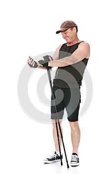 The man is engaged in Nordic walking