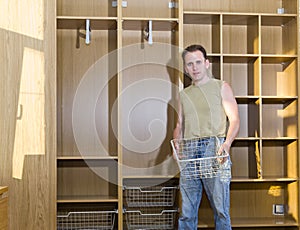 The man is engaged repair and furniture assembl