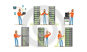 Man Engineer Working in Server Room. Digital Computer Center and Data Support