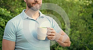 man enjoy coffee in the morning. man enjoy coffee outdoor. cropped photo of man enjoy coffee.