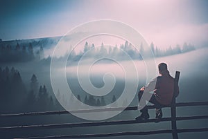 Man enjoy misty valley. Instagram stylization