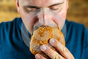 Man Enjoying Burger
