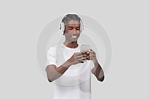 Man enjoying music on smartphone and headphones