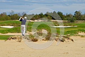 A man enjoying playing golf