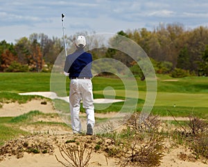 A man enjoying playing golf