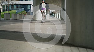 Man enjoying a ride on skateboard. Static camera. Copyspace