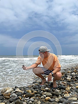 Man enjoying the sea on a sunny day photo