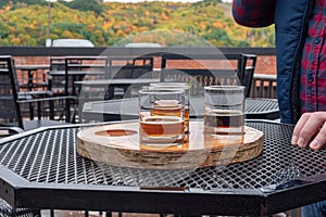 Man enjoying a variety of seasonal craft beer