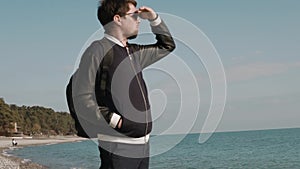 Man enjoying view on the beach.