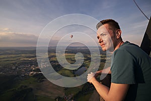 Man enjoying view from hot air balloon
