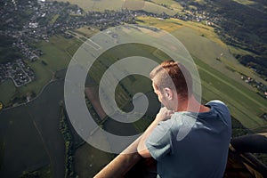 Man enjoying view from hot air balloon